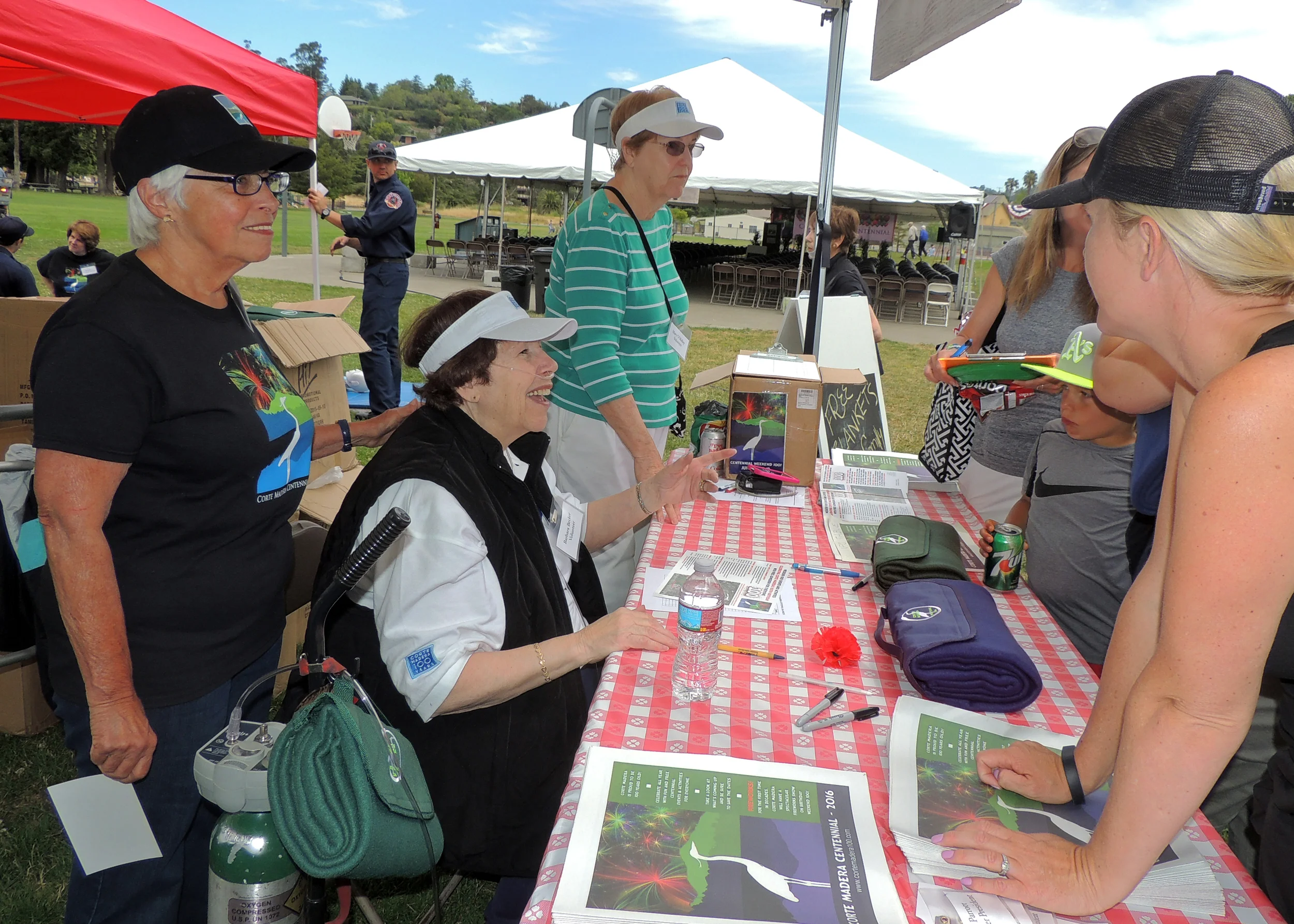(L-R) SUSAN TOPOR, BARBARA BECKER AND MARY O'MALLEY DISTRIBUTE FREE BLANKETS TO CORTE MADERA RESIDENTS