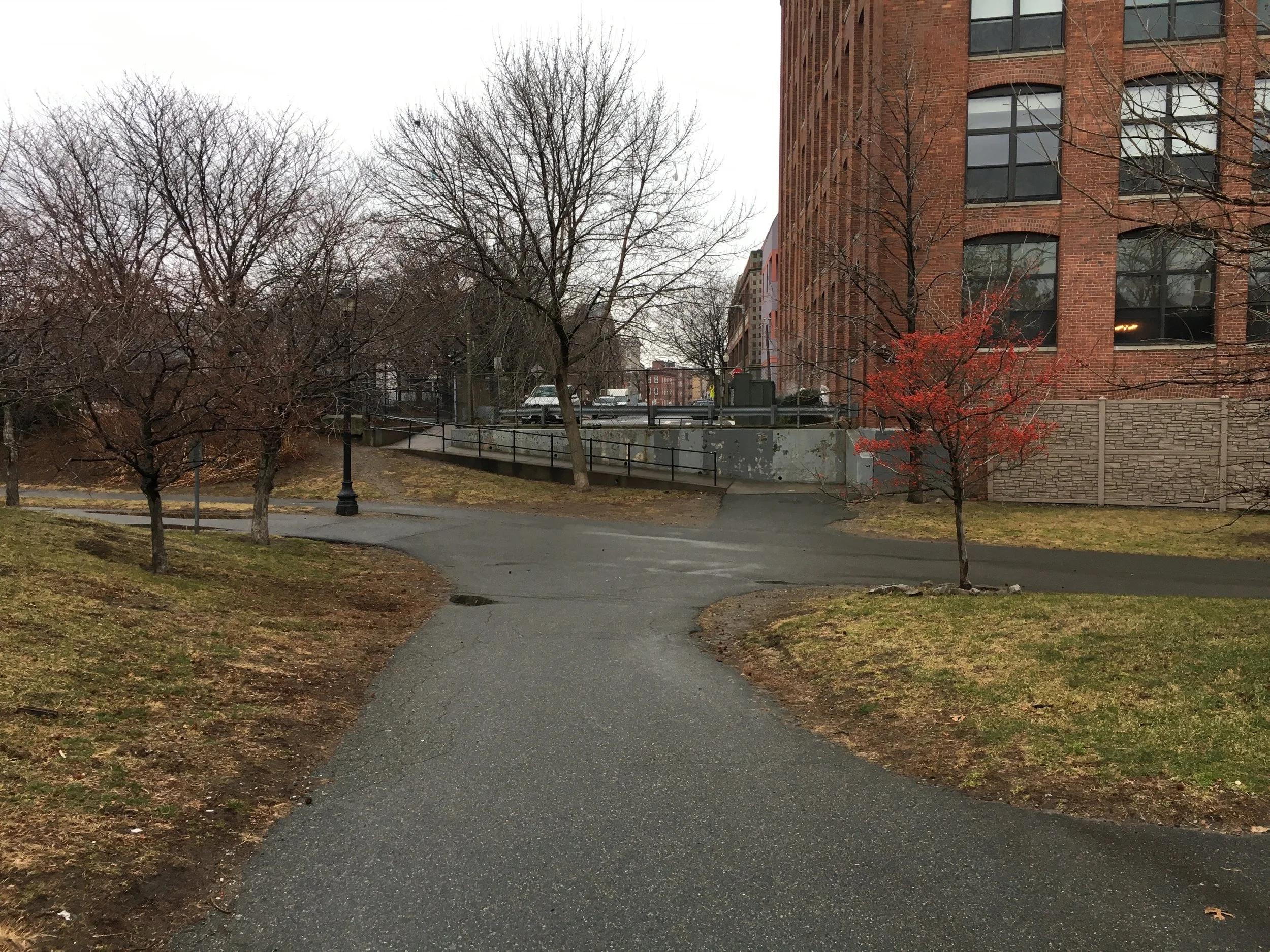 Before/current: A cold and rainy January day at the current state of the Gove Street entrance to the greenway.