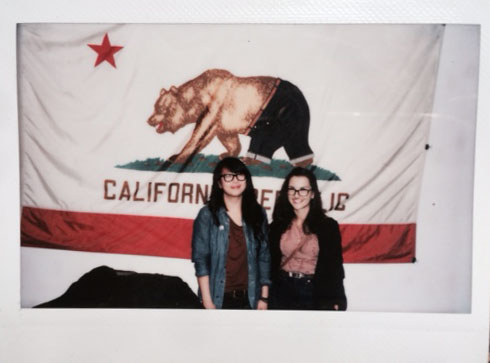Sam and Liz in front of the Denim bruin flag
