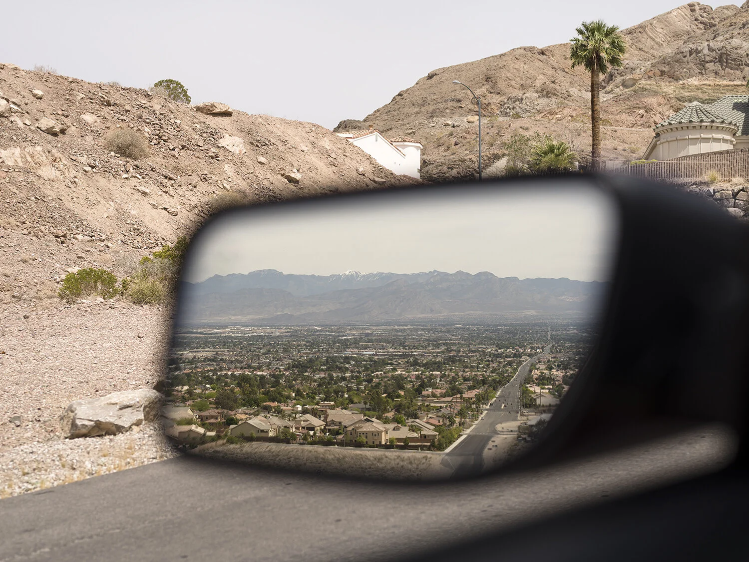 Las Vegas and desert through car side mirror_web.jpg