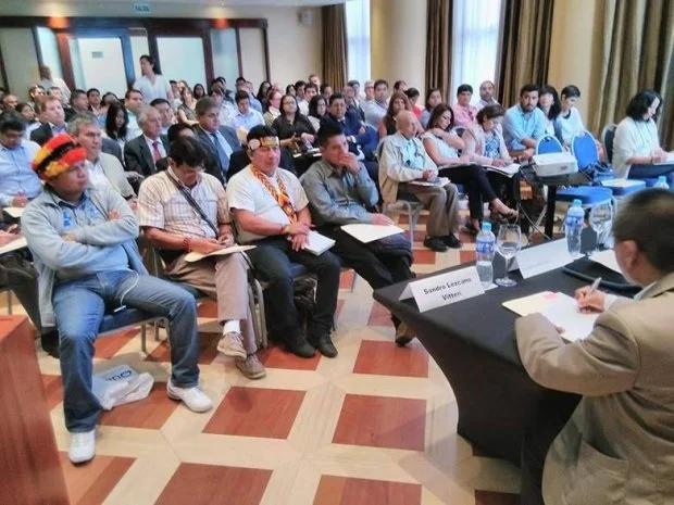 April 24, 2017 Lima, Peru: E-Tech International staff Diana Papoulias, Ricardo Segovia, Ann Maest and her daughter Emma Cooney (second row right) join our Loreto, Peru Amazon basin indigenous Apu clients (front) listening to the Environmental Fund of Peru (FONAM) announce bidding for companies to develop plans to characterize and remediate the first 32 oil production contaminated sites in the region This is the first public action to cleanup under an indigenous federation-government 2015 treaty that E-Tech helped negotiate and now implement. The group had just returned from indigenous monitor training and oil pollution monitoring in the Pastaza river basin, one of the 4 contaminated river basin zones. For newspaper article this photo was in see: http://larepublica.pe/politica/868944-fonam-anuncia-el-inicio-de-la-descontaminacion-de-32-lugares-en-loreto