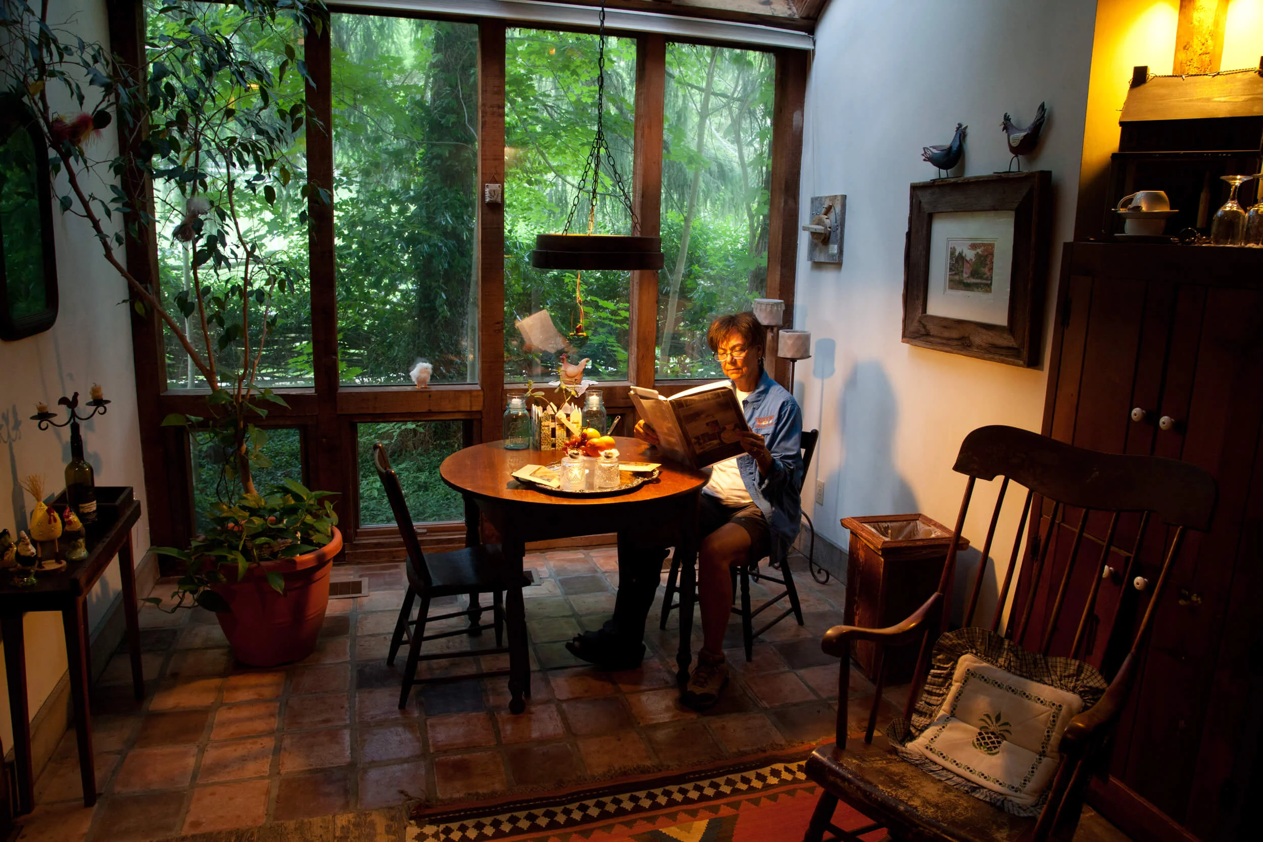 Terry at the Inn at Brandywine Falls. Hobbling around park visit #43 . (Note boot on her right foot.)
