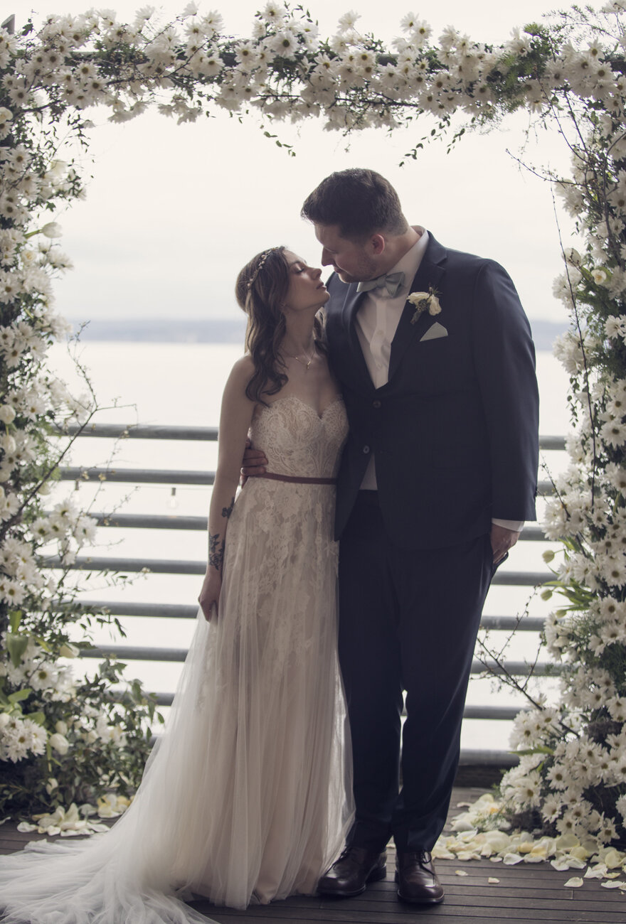 Daisy Arch at  Seattle waterfront winter wedding by Bond in Bloom.jpg