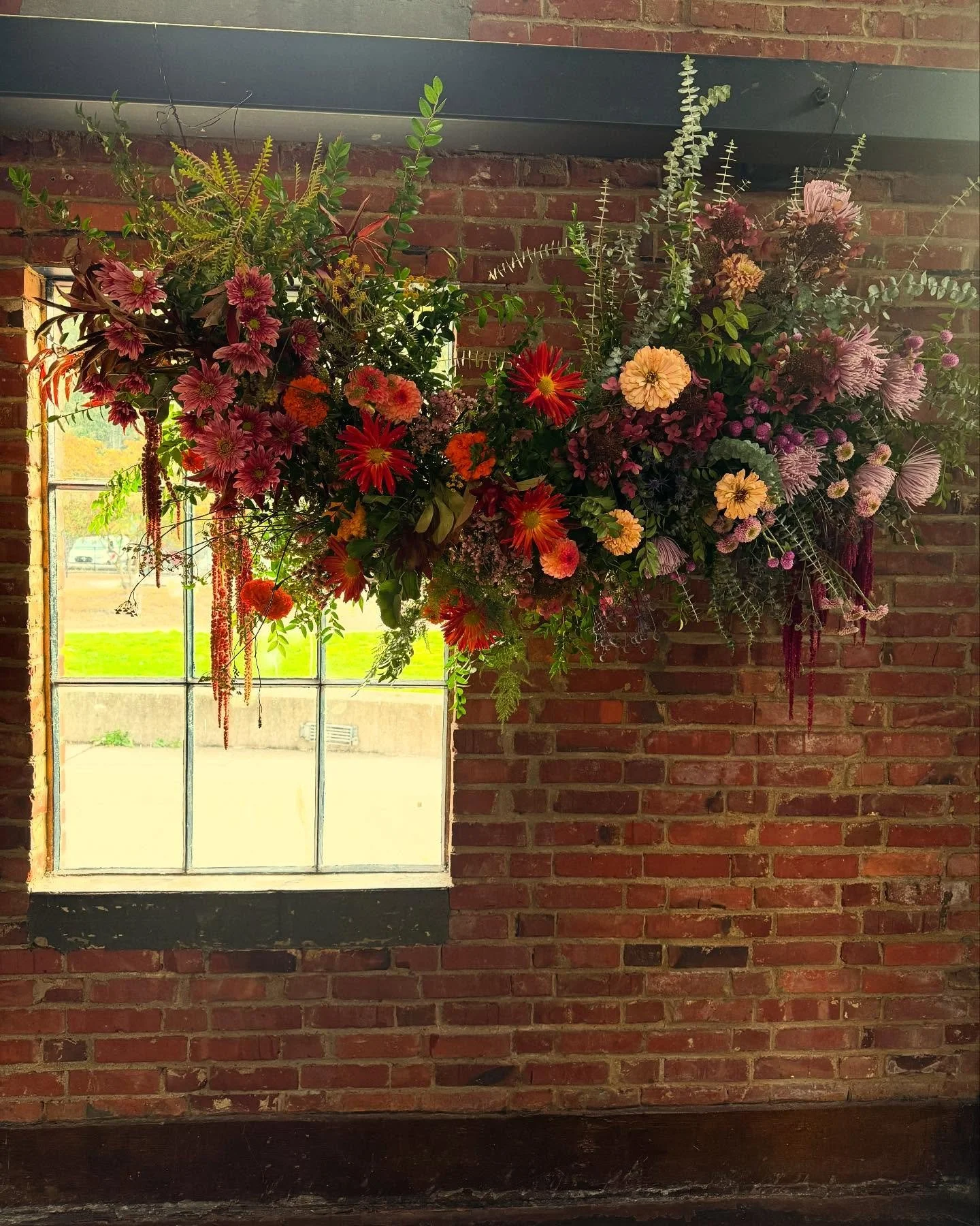 This is the kind of project I love- creating a floral installation. 

I love thinking about the colors and textures and creating a kind of art piece. The immediacy of the flowers (a living/ dying thing) and the timeline of the day leaves no room for 
