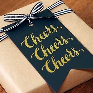 Cheers Gift Tags | Client: Sugar Paper | Lettering: J. Reynolds | Additional Products: Bubbly Cheers Coaster , Cheers To Us Card , Bubbly Cheers Gift Tag