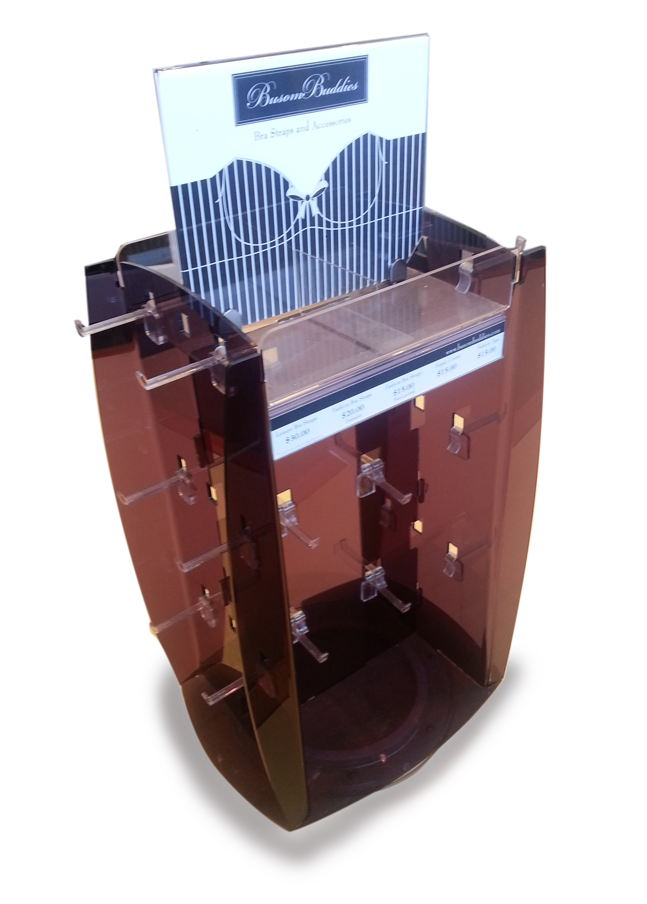 Acrylic spinning counter unit for Bra accessories. H shaped layout maximises stock facings in a small footprint. Stock also displayed on top shelf