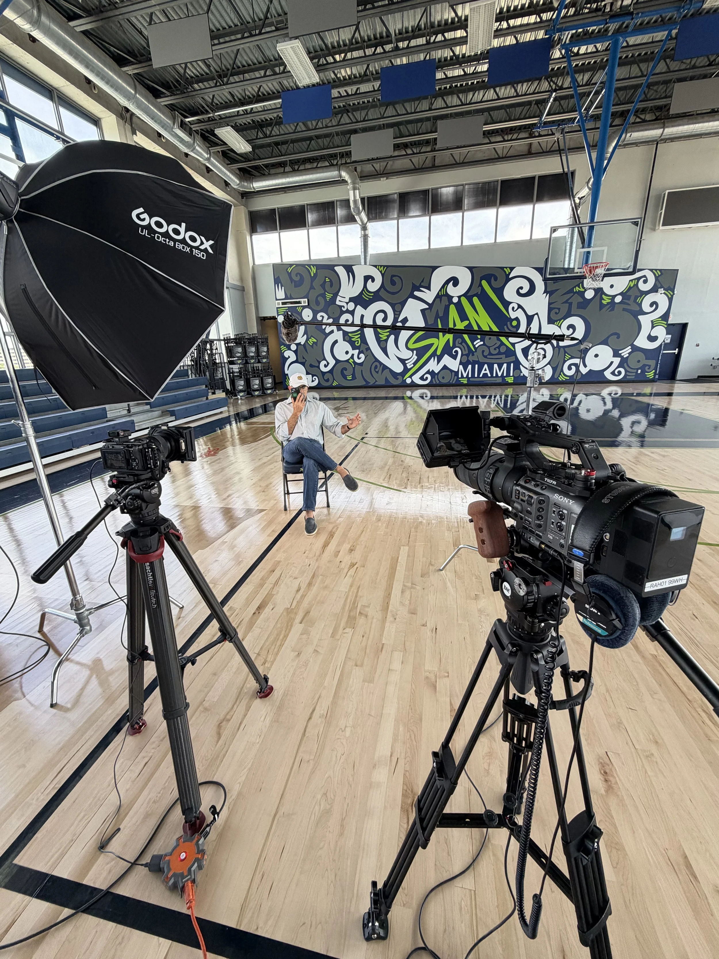 Documentary interview production setup with professional camera and lighting at a Miami location