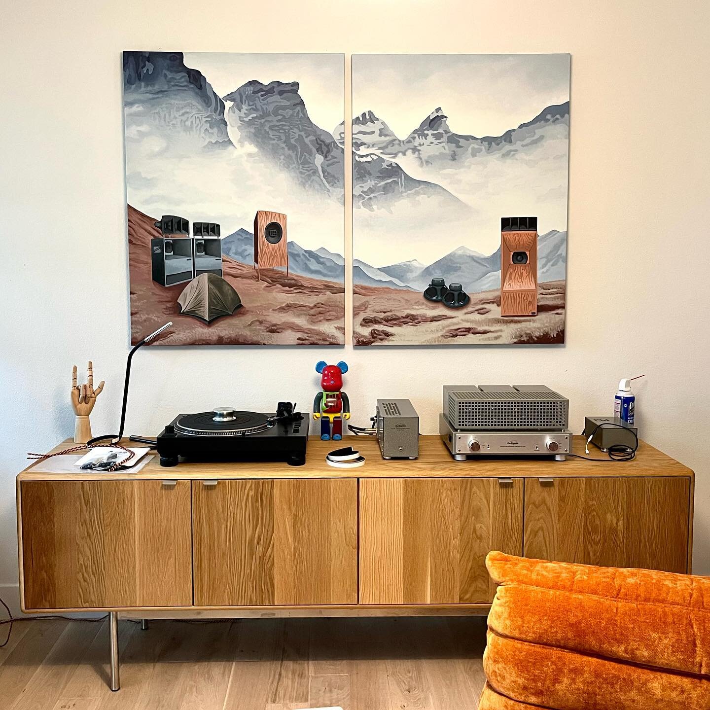 Fun stuff. I was visiting my client @j_mmckee today, and before I left he showed me a painting by @colinjamesbehr he had commissioned for his listening area. It was a thrill to see that a speaker I built made it into the landscape. Swipe through to s