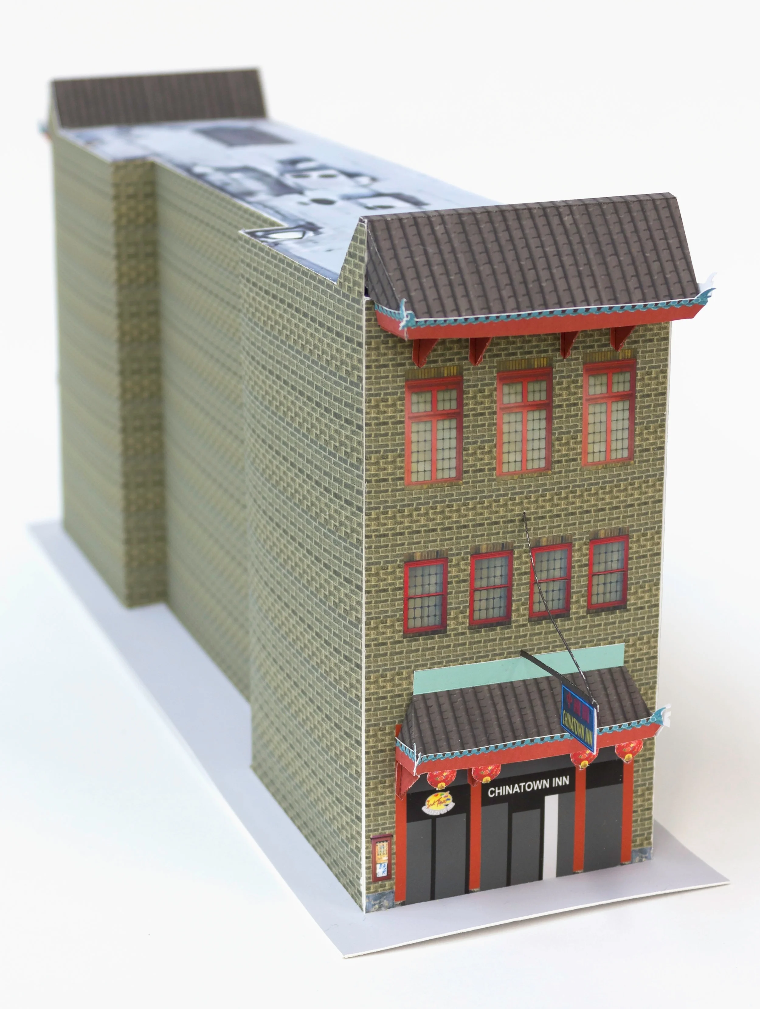 Pittsburgh's Chinatown, 2018 This is a DIY paper craft model of 520 Third Ave, the only remaining building with a physical trace of this city’s historic Chinatown. Pittsburgh’s Chinatown formed in the late 1800’s, a small part of the large migration of people traveling west during the Gold Rush. At its height in the 1920s, some 500 residents and 25 businesses called Second and Third Avenues between Ross and Grant Street their home. Chinatown’s decline is due in part because the construction of the boulevard of the Allies that bisected the neighborhood. Download and build your own here.