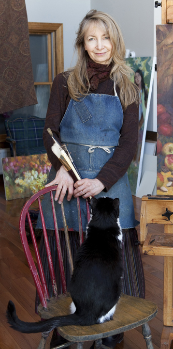 Nancy creating with her furry friend Zorro.