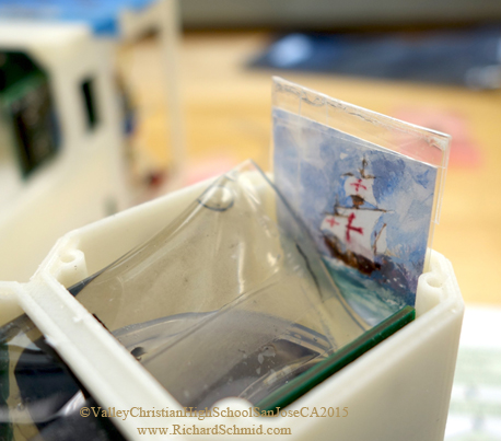 SANTA MARIA II, Richard Schmid, Watercolor, 1.25”x1.25” Painting being placed in the young scientist’s experiment; the artwork is protected in glassine envelopes sealed with waterproof tape. (Now in orbit thanks to Valley Christian High School, San Jose, CA, http://www.vcs.net/ )