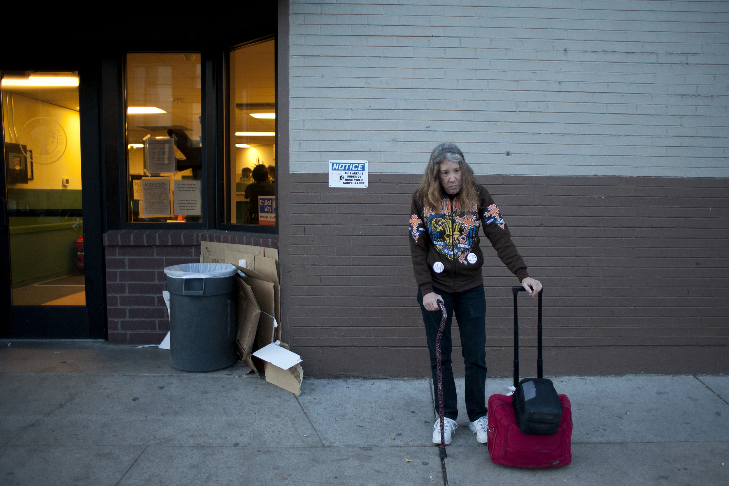 Denver, CO- Kim Orr, 57, stands outside of the St. Francis day shelter in Denver, CO. She suffers from MS and often has to stop to catch her breath after walking longer distances. She has been homeless for just over a year after her husband left her practically stranded in an Aurora, CO hotel with only $20.