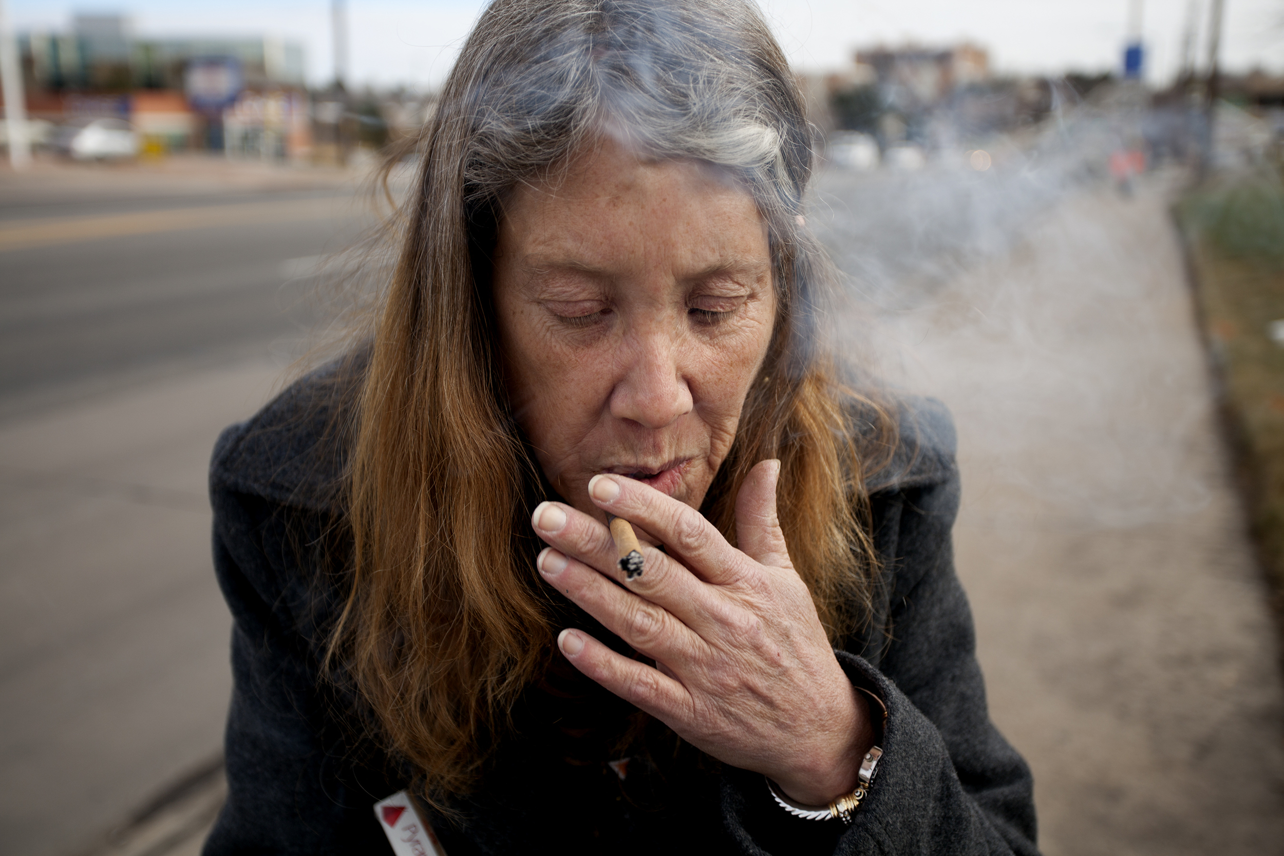 Denver, CO-Kim smoked for 15 years and then quit for 11. She started smoking again her first night on the street. 