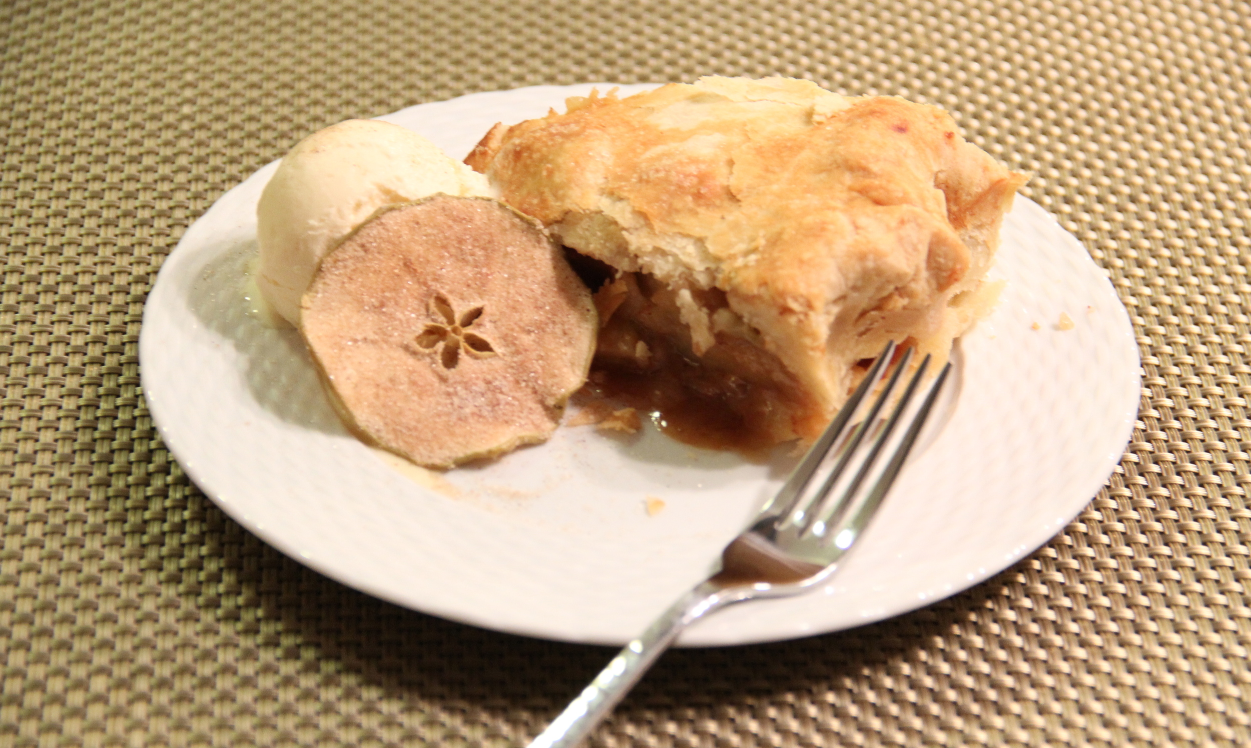 Flaky Golden Crust and a Perfectly Cooked Apple Filling. Served ala mode of course and garnished with a Cinnamon Sugared Simple & Crisp Apple Crisp. 