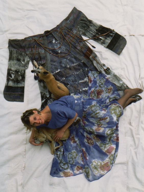 Gale Gassiot wearing hand-painted silk garments on silk kimono, posing with whippets, Canela and Flan. 