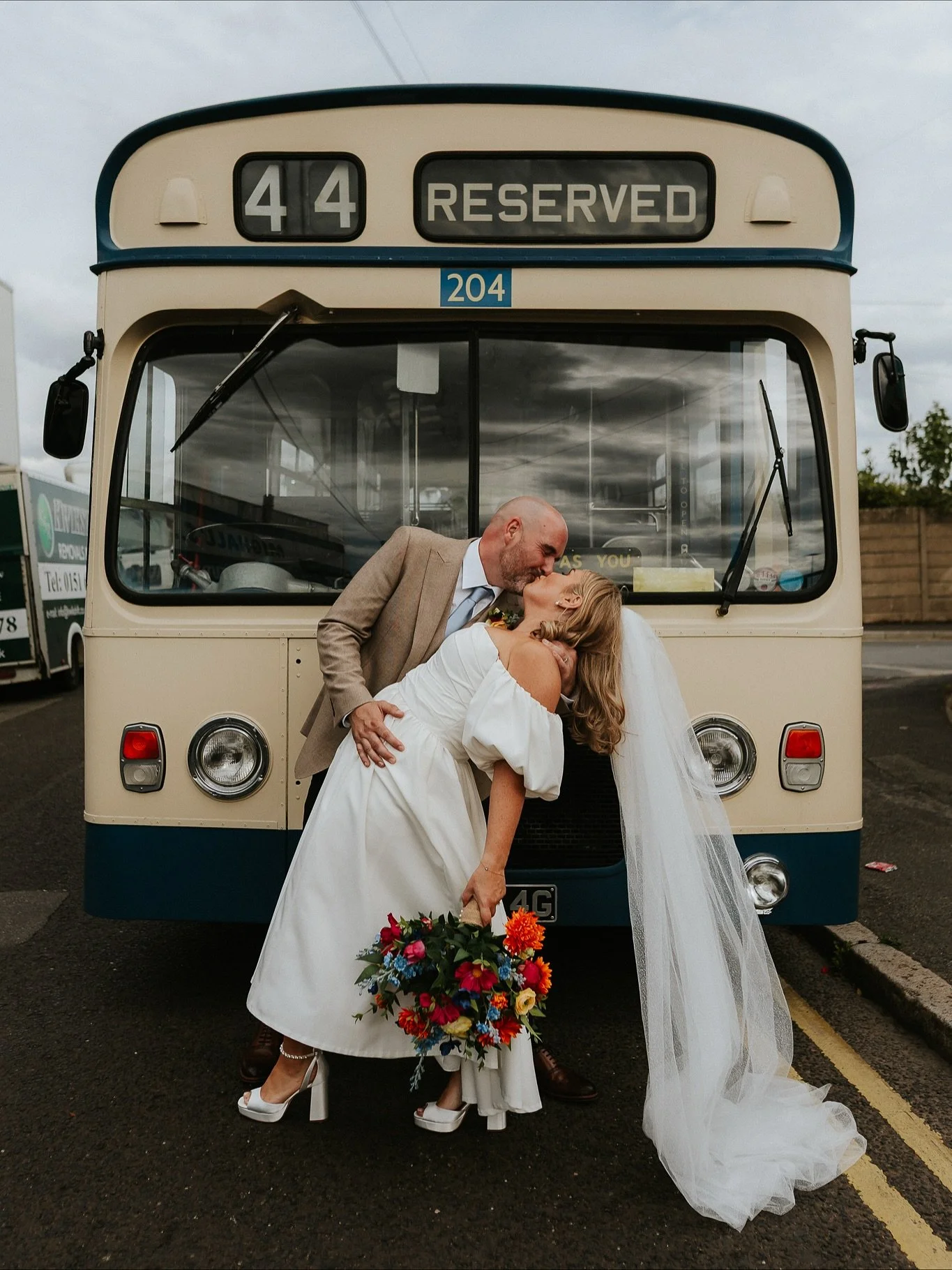 Charlotte &amp; Carl ⚡️REWIND⚡️

Throwing it back to brighter days, with a splash of colour in the C&amp;C archive from earlier this year 🧡💙🩷

Venue -&nbsp;@bloom_building
Dress -&nbsp;@fbbridalstudio
Grazing Board -&nbsp;@grazeuponus
Pizza -&nbsp