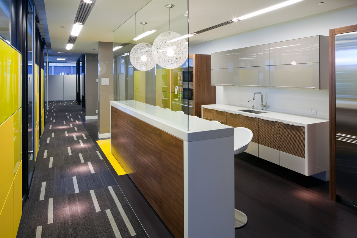Baytex Energy Corp Centennial Place, Calgary 2009 A high-contrast tenant improvement that uses colour and variations in material finish to break-down long interior corridors and provide way-finding. Clerestory glass is used to make rooms feel larger.
