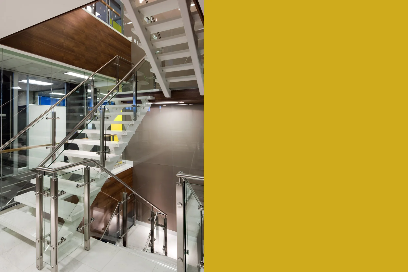 Baytex Energy Corp Centennial Place, Calgary 2009 A high-contrast tenant improvement that uses colour and variations in material finish to break-down long interior corridors and provide way-finding. Clerestory glass is used to make rooms feel larger.