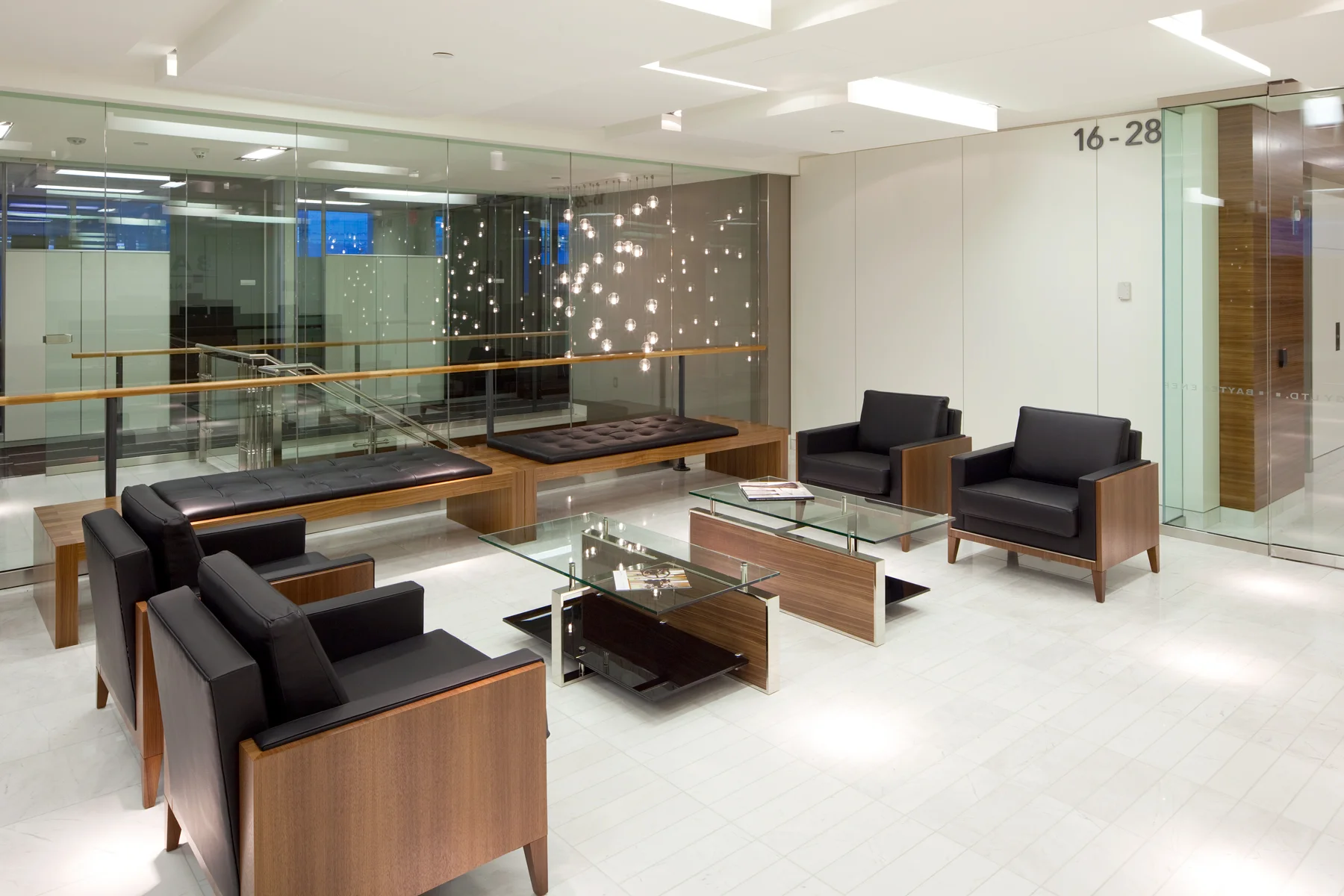 Baytex Energy Corp Centennial Place, Calgary 2009 A high-contrast tenant improvement that uses colour and variations in material finish to break-down long interior corridors and provide way-finding. Clerestory glass is used to make rooms feel larger.