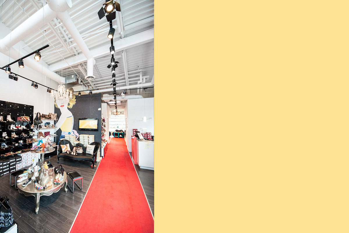 Shoe Muse Aspen Landing, Calgary 2012 A boutique shoe store featuring an eclectic mix of interior design styles and details to match the eclectic collection of shoes. A "runway" draws customers to the great view from the rear of the store.