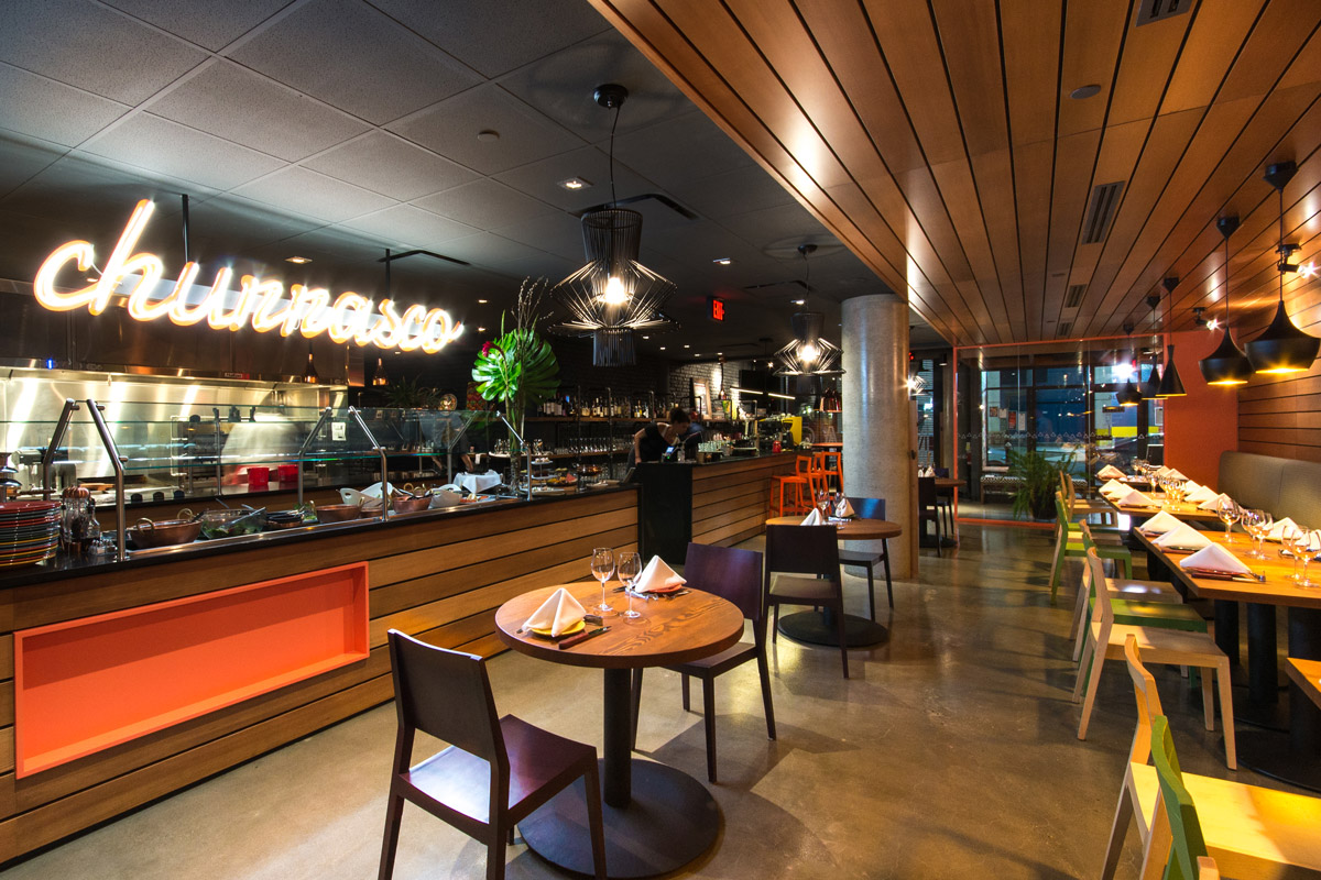 Minas Brazilian Steakhouse Eau Claire Calgary, 2015 Minas Brazilian Steakhouse offers traditional Brazilian food in a contemporary setting. A bold colour palette and an eclectic mix of finishes and fixtures suit Minas' energetic and lively vision.