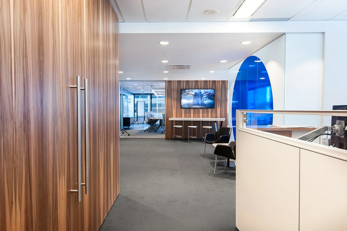 Chubb Insurance Calgary Place 1, Calgary A fresh take on Chubb Insurance's interior design standards. Designed to reinforce their brand, the space combines rich warm wood tones with crisp, cool finishes to create visual interest.