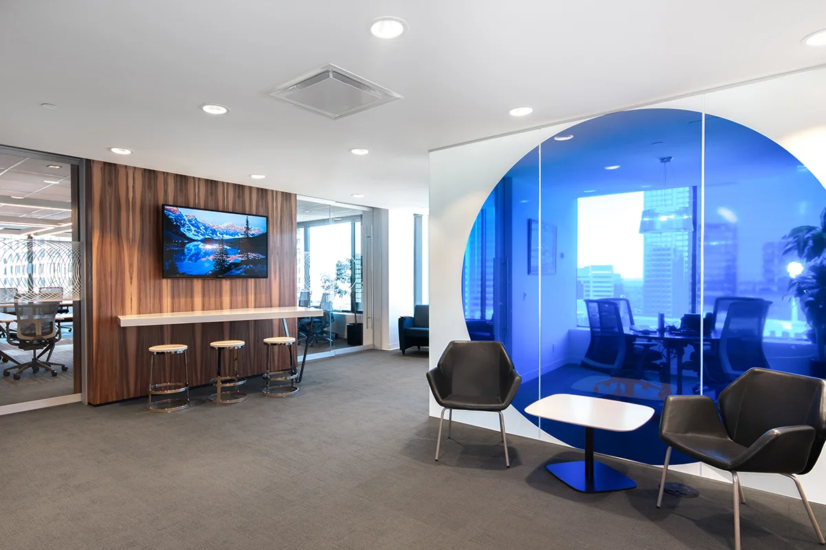 Chubb Insurance Calgary Place 1, Calgary A fresh take on Chubb Insurance's interior design standards. Designed to reinforce their brand, the space combines rich warm wood tones with crisp, cool finishes to create visual interest.