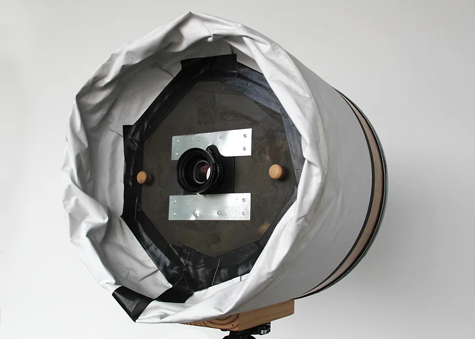 Camera modified for blown glass plates.