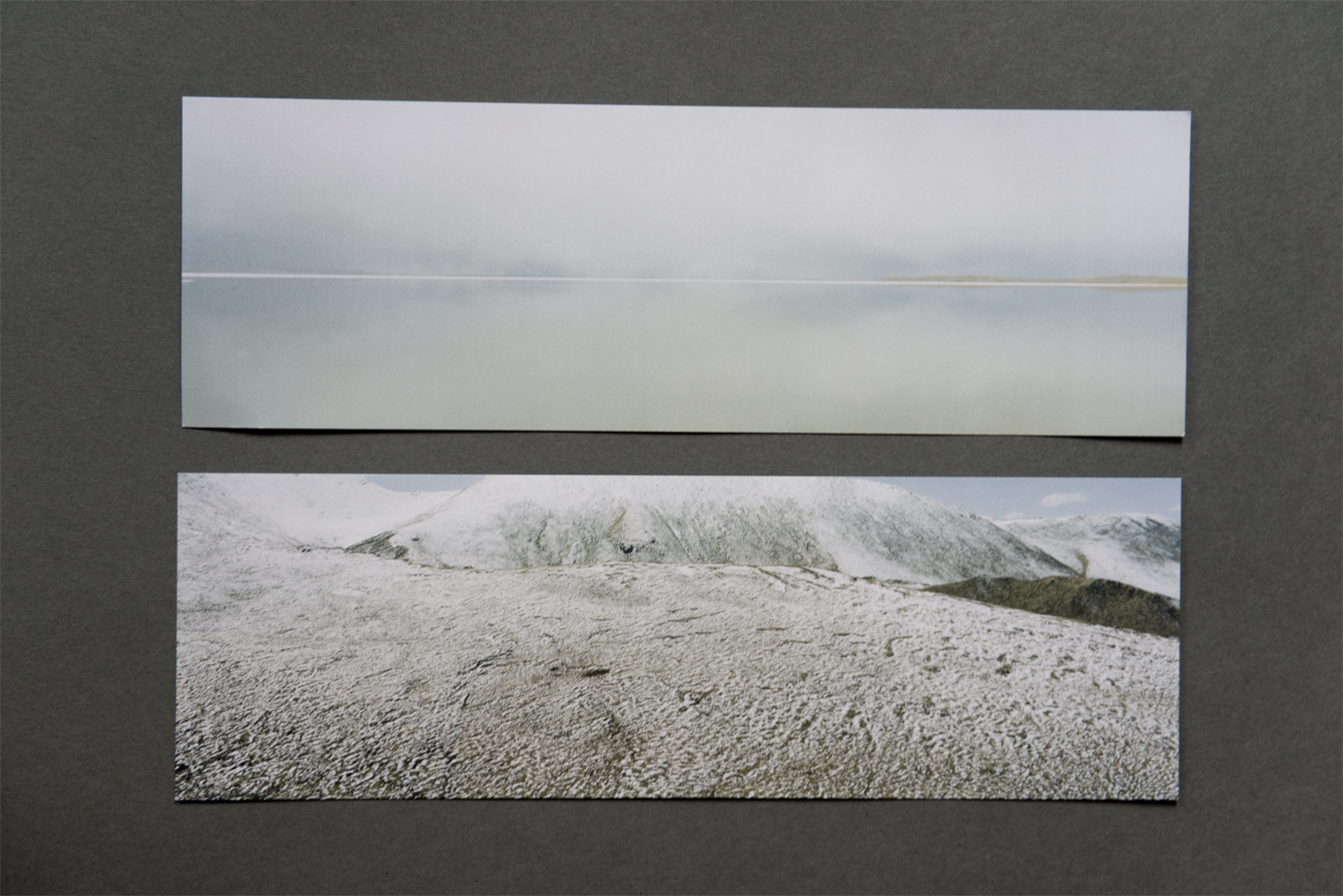 For unusually shaped photographs, the standard postcard just doesn’t cut it. Ian Teh’s elongated cards are perfectly suited to his panoramic images of China’s Yellow River. The sturdy cardstock keeps them from feeling flimsy or bookmarkish and the lack of glossy finish allows for the full range of the subtle color palate to come through. Designed to accompany his Photoville exhibition, the cards comprise a set of five, each one with a different photograph on the front. The long shape allows for more information about the project than is common. The back of the card contains a project statement and a brief biography of the artist.