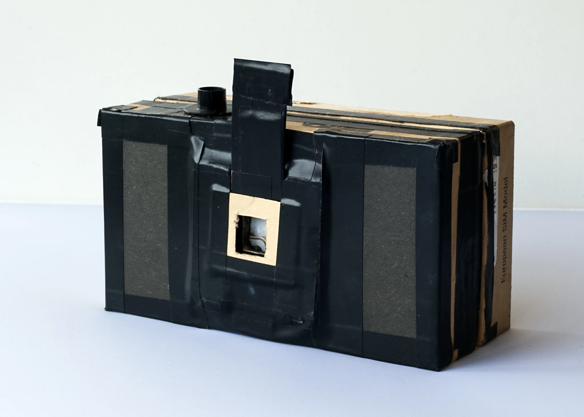 35mm pinhole camera made from a smartphone box.