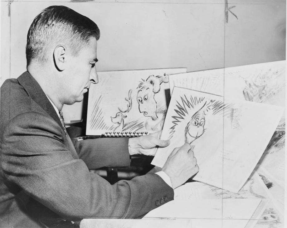 Dr. Suess (Ted Geisel) at work on a drawing of a grinch, the hero of his forthcoming book, "How the Grinch Stole Christmas," 1957. Photo by Al Ravenna, World Telegram & Sun.