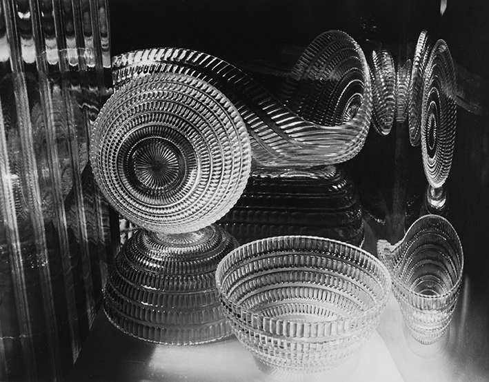 Carlotta Corpron (American, 1901-1988), Glass Springs, 1945; 1993:26 During a period of intensive creative activity in the 1930s and 40s, Carlotta Corpron investigated the expressive potential of light in six successive series of photographs. Initially she experimented with solarization techniques and used the camera to record moving lights, making what she called "light drawings." In the mid-1940s she began to concentrate on studies of light in a controlled studio setting. During this period the influential artists László Maholy-Nagy and Gyorgy Kepes, who were known for their photographic abstractions, relocated to Denton, Texas, where Corpron was teaching at Texas Women's University. In 1942 Corpron conducted a "light workshop" at the university under the direction of Maholy-Nagy, who was one of the pioneers of the photogram, but it was Kepes, Maholy's former colleague, who influenced Corpron after his arrival in 1944. For a number of months Corpron met frequently with Kepes, who praised her work and which he described as "light poetry."
