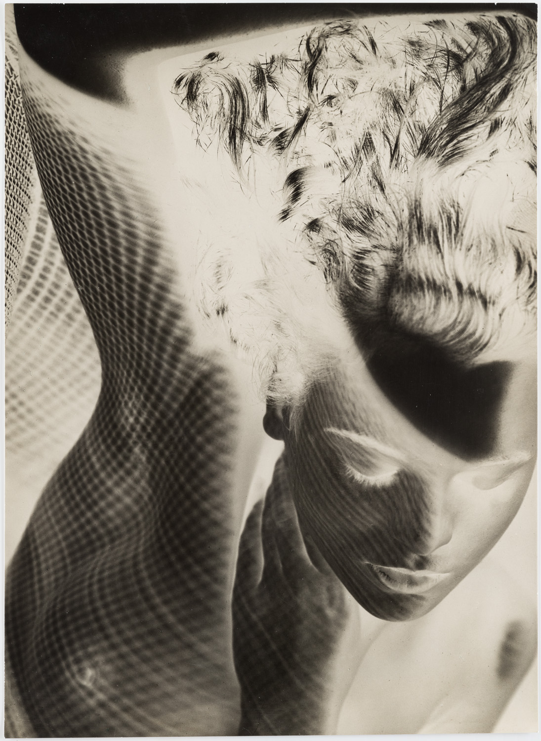 Max Daupin, Solarised Jean in Wire Mesh , 1938 © Max Dupain, MOPA’s Peter and Olivia Farrell Australian Photography Collection