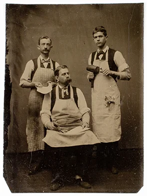 Edward Wilson Carpenter, publisher of the Amherst Record , and two printers. Tintype. Amherst, Massachusetts, ca, 1890. 517686.