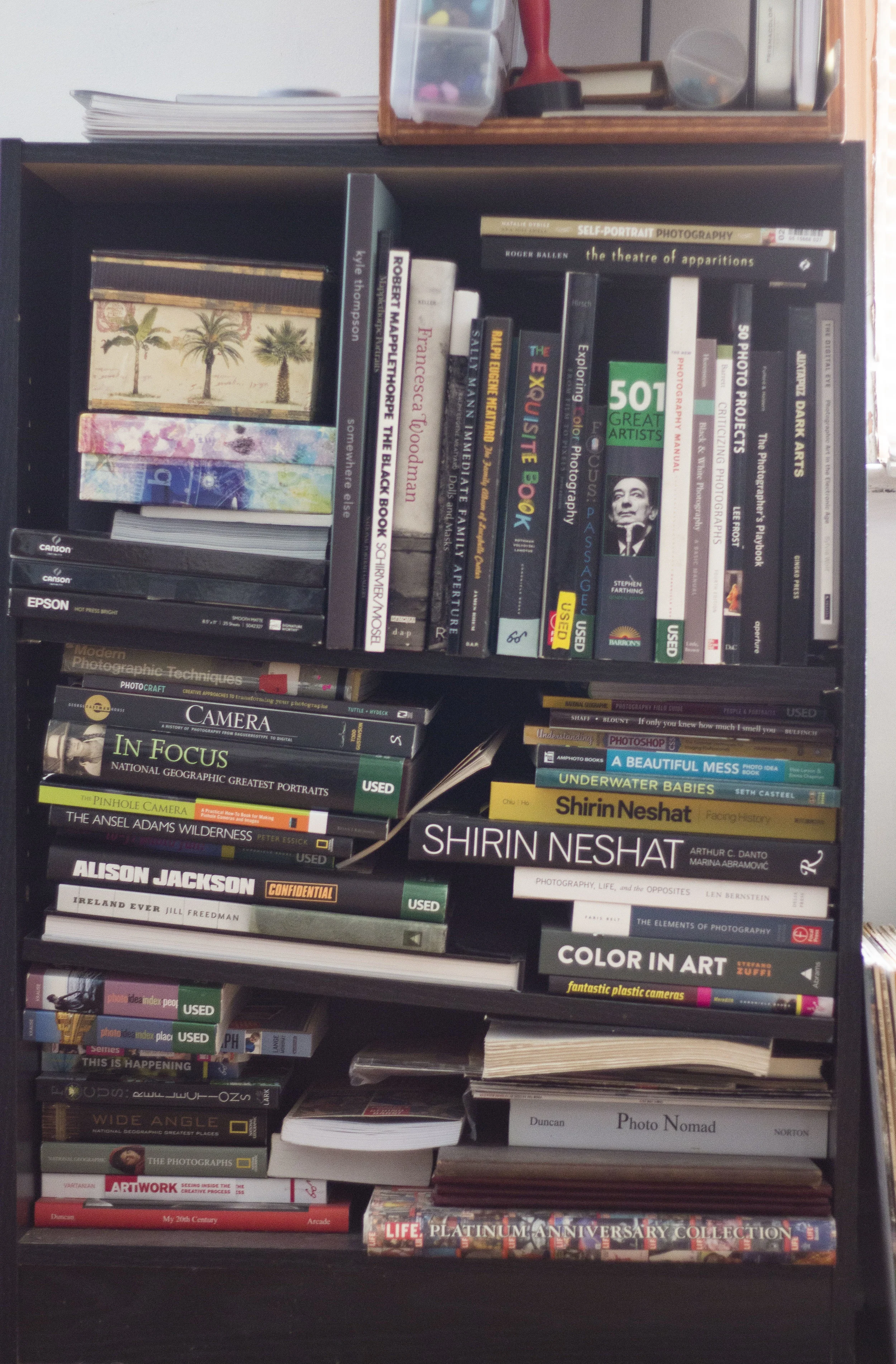 Etta Martin's precarious photobook piles.