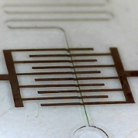 3D conformal nickel microelectrodes embedded in polycarbonate with embossed microfluidics