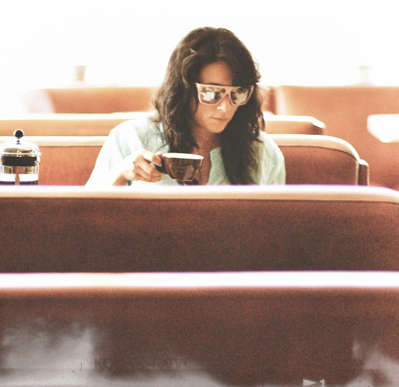 Lindsey in booth.png