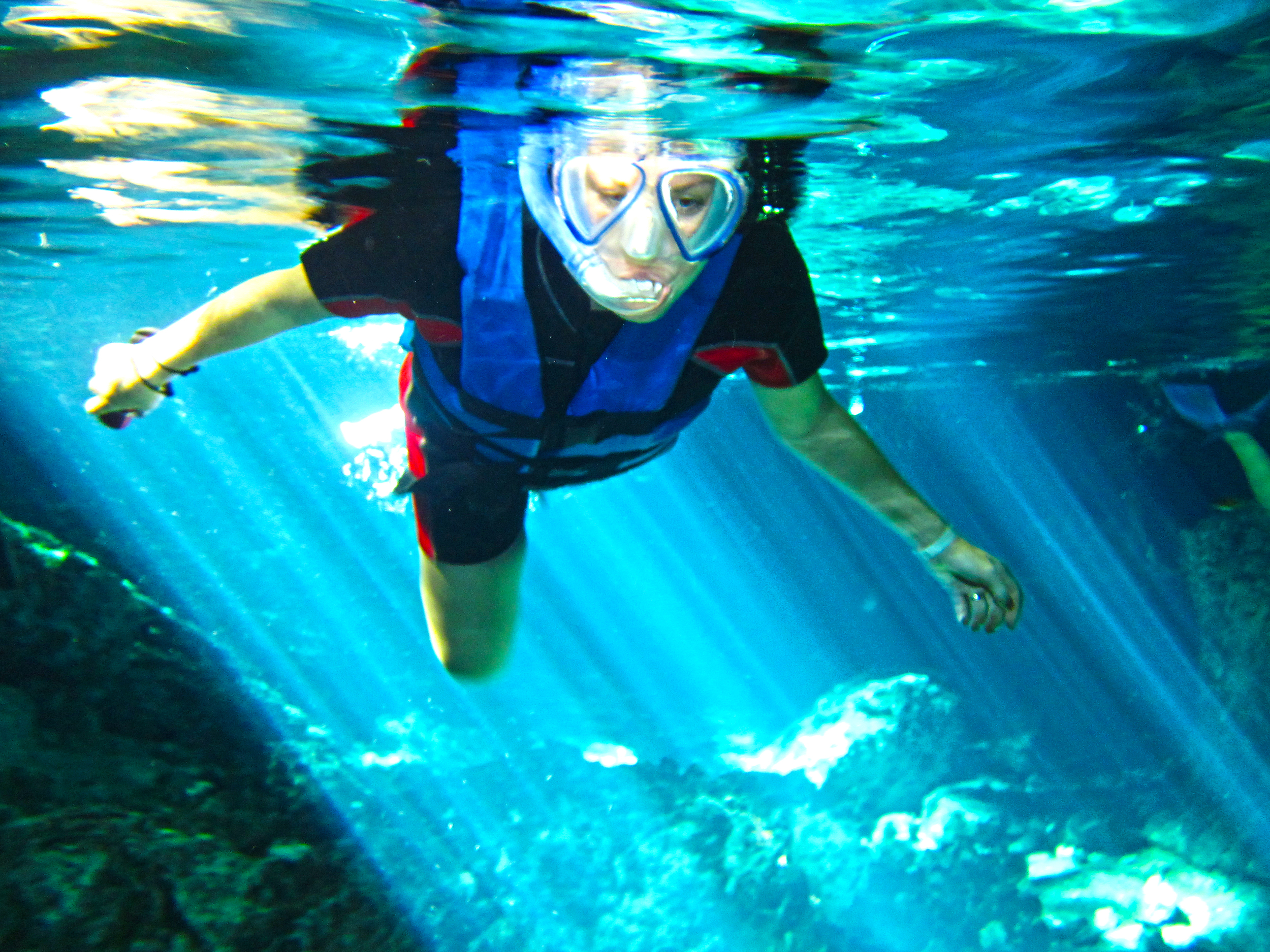 Snorkeling for the first time in the Dos Ojos Cenote, Mexico.