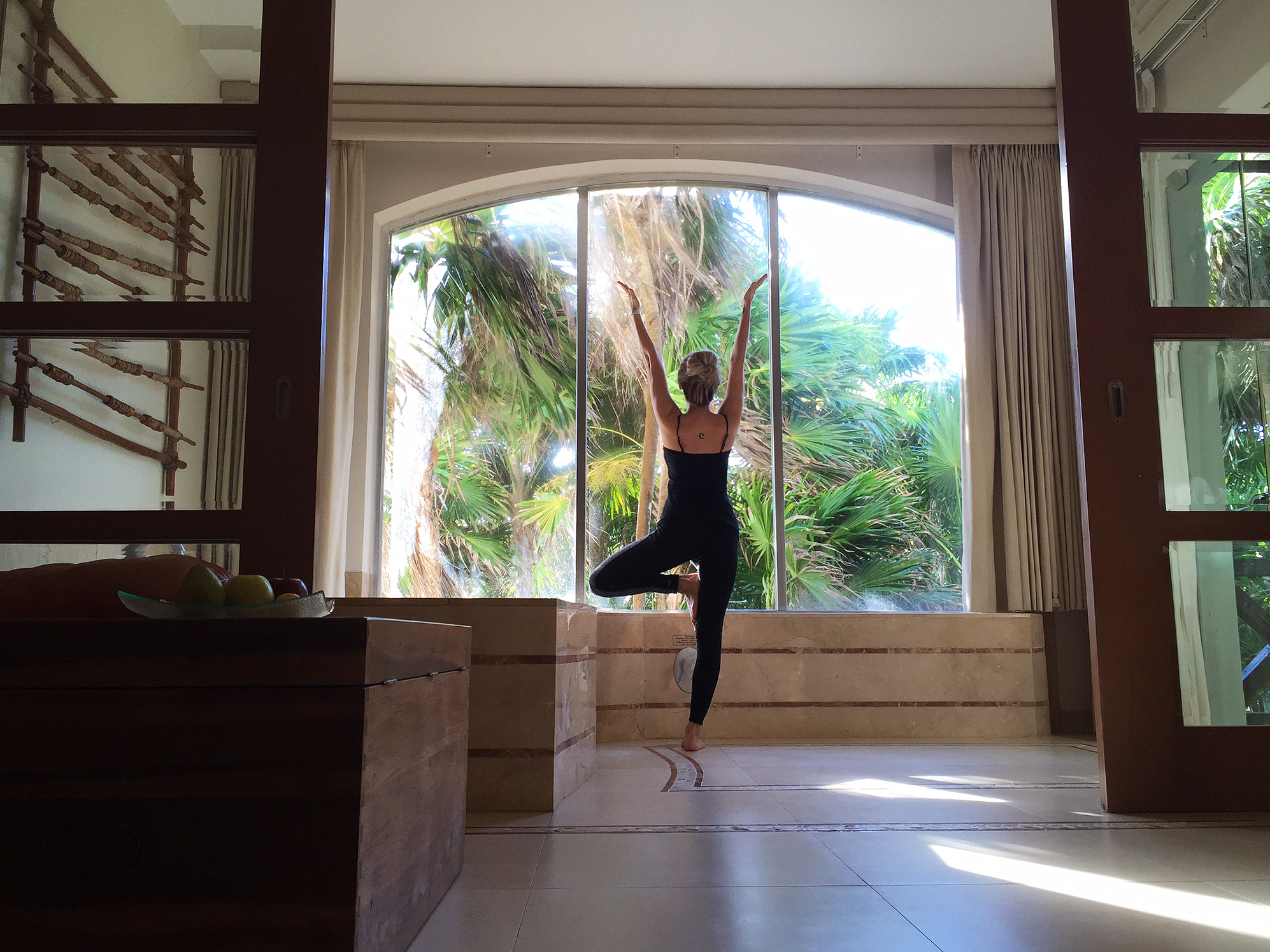 The intention: A yoga practice on the beach. Reality: 3 in-my-room yoga poses and 3 self timer pictures followed by a mojito in a seated position on the floor.