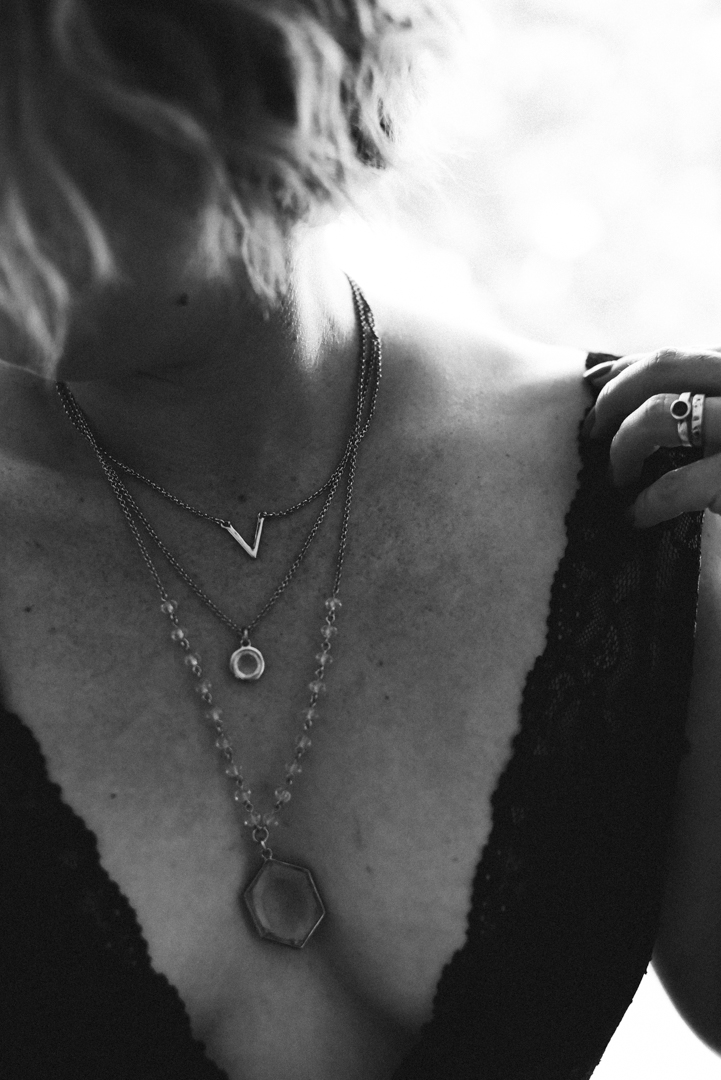 MISS "G" SAID... " I wanted a boudoir shoot before my wedding, but I just didn't get around to it. What I came to realized is that the fates had something better in store for me because not long after I got married, I found Kara Marie Boudoir and began stalking her blog and social media, dreaming of the day I would get to have my own shoot, not just a boudoir, but A KMB shoot. I would see outfits and imagine what they would look like in Kara's photos - not super creeper like, just seeing her talent and knowing she would make everything AH-mazing. As my husband and I started to talk about having kids, I knew I wanted to get the opportunity to have a "pre-mom" body experience and so I ask (begged, pleaded) and we went all in with the full package - hair/makeup/shoot/book. It was really the best way to go - I felt like a million bucks after Kendall got done with my hair and make up and Kara was so wonderful to work with as we laughed and posed and had a ball. I felt like a Victoria Secret model! I KNEW the shoot went well and couldn't wait for the reveal. When reveal day came I had over 100 photos to have to choose from - and I was worried about even getting the 10 to fill the book! Choosing which ones to get was the hardest part because they were all so good. I'm pretty self conscious and critical of myself (what girl isn't) but I didn't even see the flaws - and that was the most amazing part of the whole experience, I saw myself for how my husband sees me, and damn if I'm not a serious hottie! Everyone is always critical of this or that on their body. Everyone always thinks, I need to be a certain weight/shape/size/personality/whatever to do something like a boudior shoot and let me just say - no, you don't, you just need to be YOU and make the call! The whole experience makes you feel like a million bucks, which makes the cost a pretty good ROI if you need to justify it. Getting your make up and hair done, getting to listen to music, and letting your inner goddess/diva out is an exhilarating experience. Almost addicting, which is why I understand people going back for multiple shoots. It isn't about being vain either, it is truly letting you being a little selfish and saying, "Why yes, I am a bad ass, sexy woman. What are you going to do about it!?"