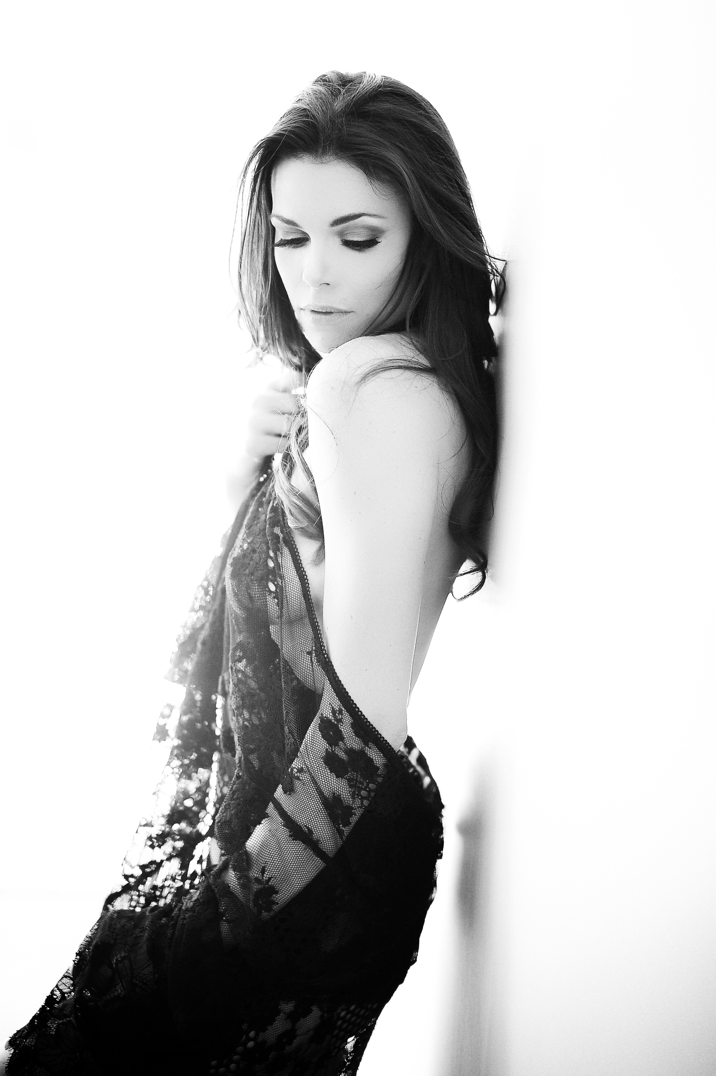 I truly have to say this is an experience like no other. I had no clue I had it in me to even book a boudoir photo shoot, much less actually follow thru and then realize I had THAT kind of sex appeal. From the very beginning Kara made me comfortable working with her. During the shoot I had never felt more excitement, butterflies and just a sense of huge confidence! Kara definitely knows how to make you put the "ass" in sass... Or maybe that's just because I told her my man was a booty guy and she knew exactly what to do to get all the right angles. The first time I went and viewed my proofs.. I literally had tears in my eyes... The day I actually picked up my book and canvas I squealed and jumped! Why had I never seen myself like this? It wasn't just the gorgeous makeup, the awesome hair or the barely there lingerie... It was the complete package and how I truly came out of my shell. I felt beautiful... Even with the imperfections I think I possess.. I saw past that and I saw a sexy woman!