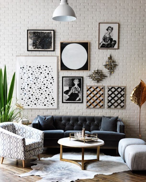 Mixing sculptural art pieces provides a different depth to the gallery wall