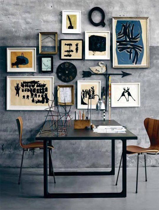 Use open frames to let the wallpaper, brick wall, or paint color to be framed out