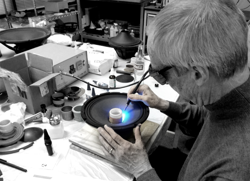 Bob Gallien getting his hands dirty testing glues for speaker manufacturing.