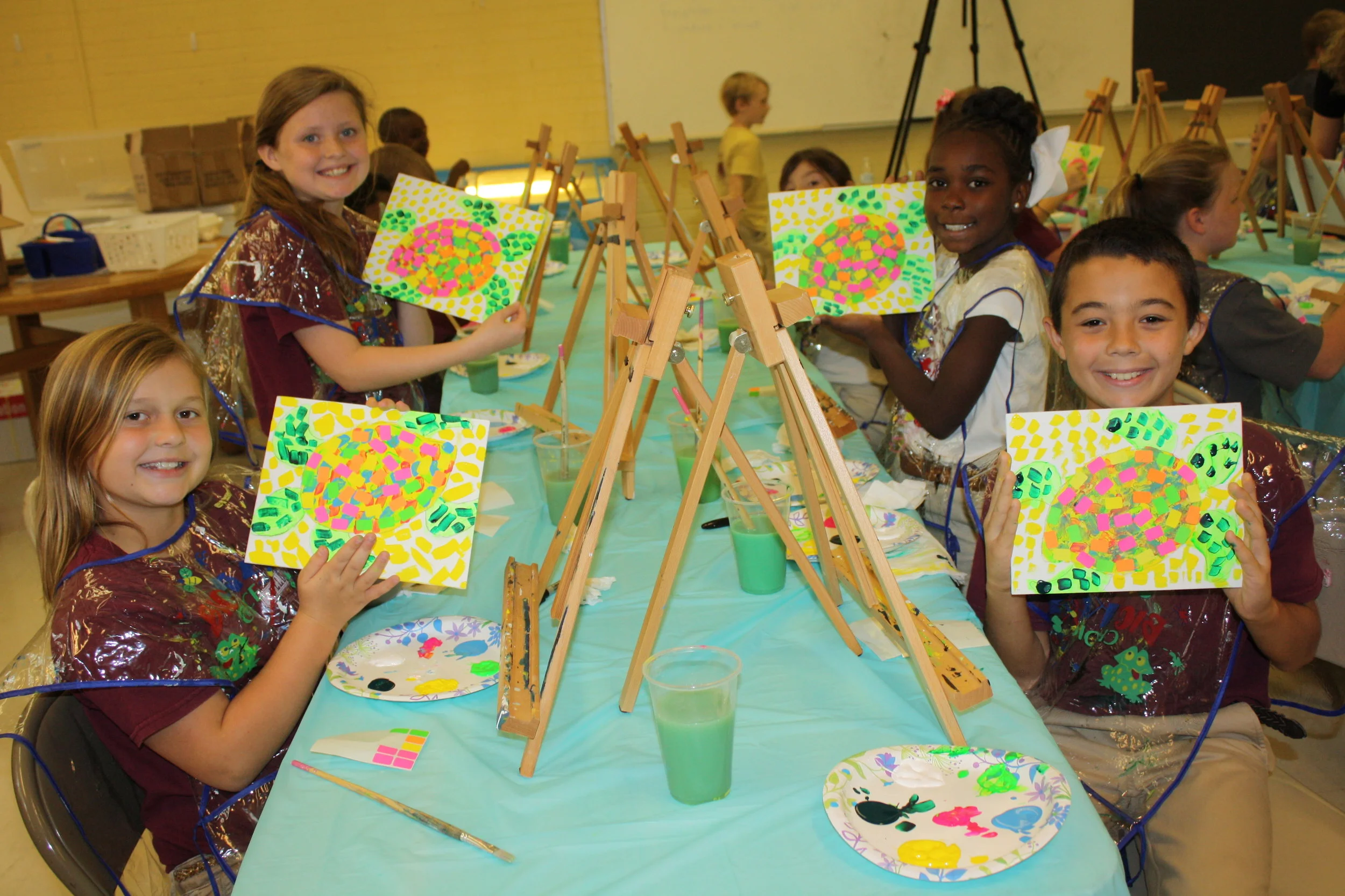 Students at Chatom Elementary showcase their masterpieces midway through the class.