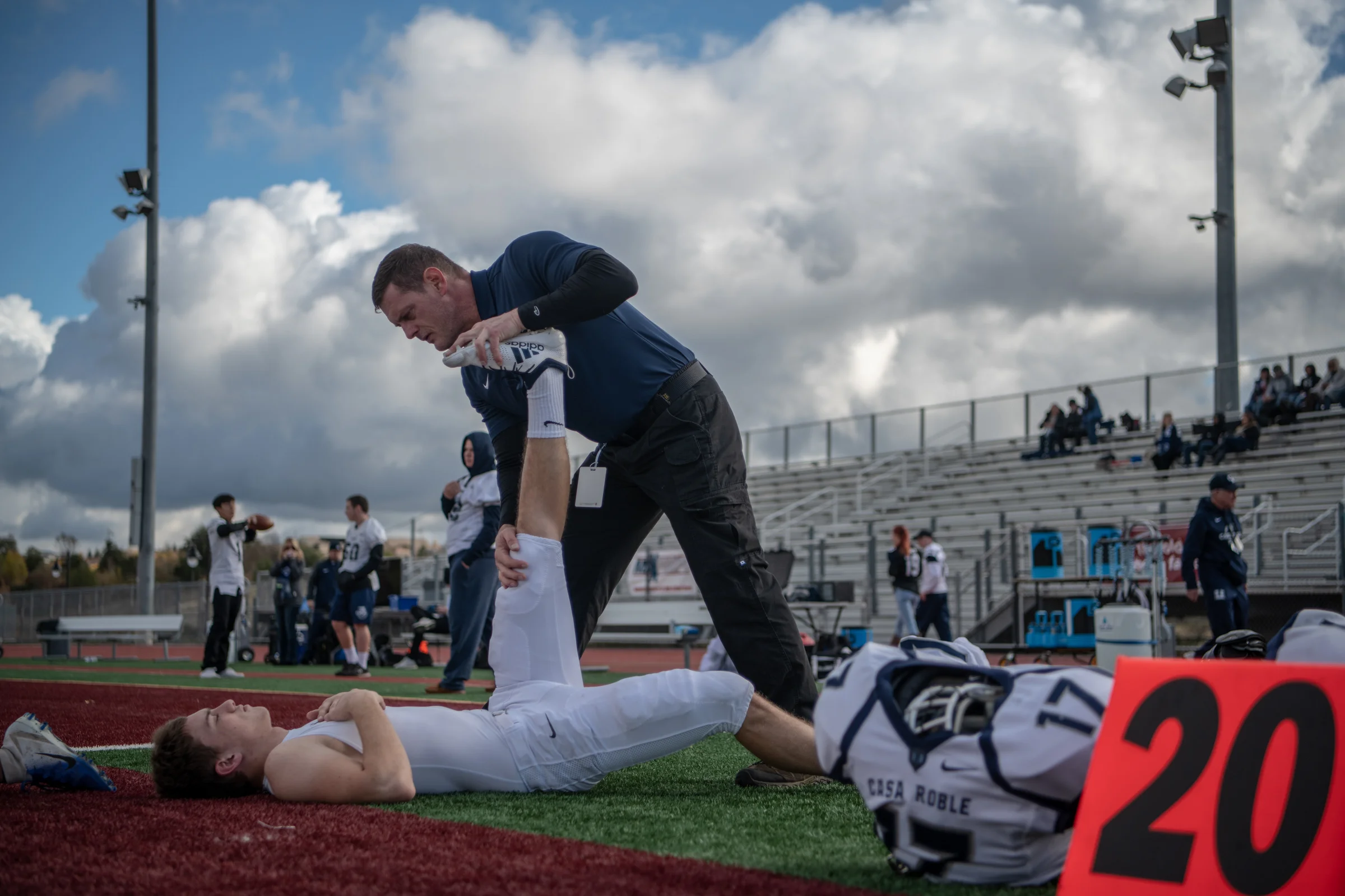 Getting Ryan stretched before the game. Photo by @s.kip