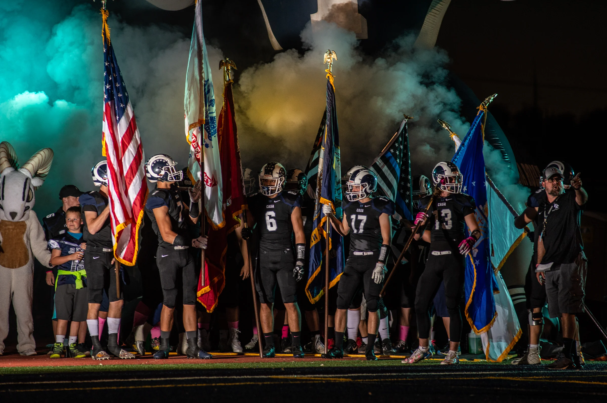 Pre game runout. Ryan carried the Navy flag at each home game.