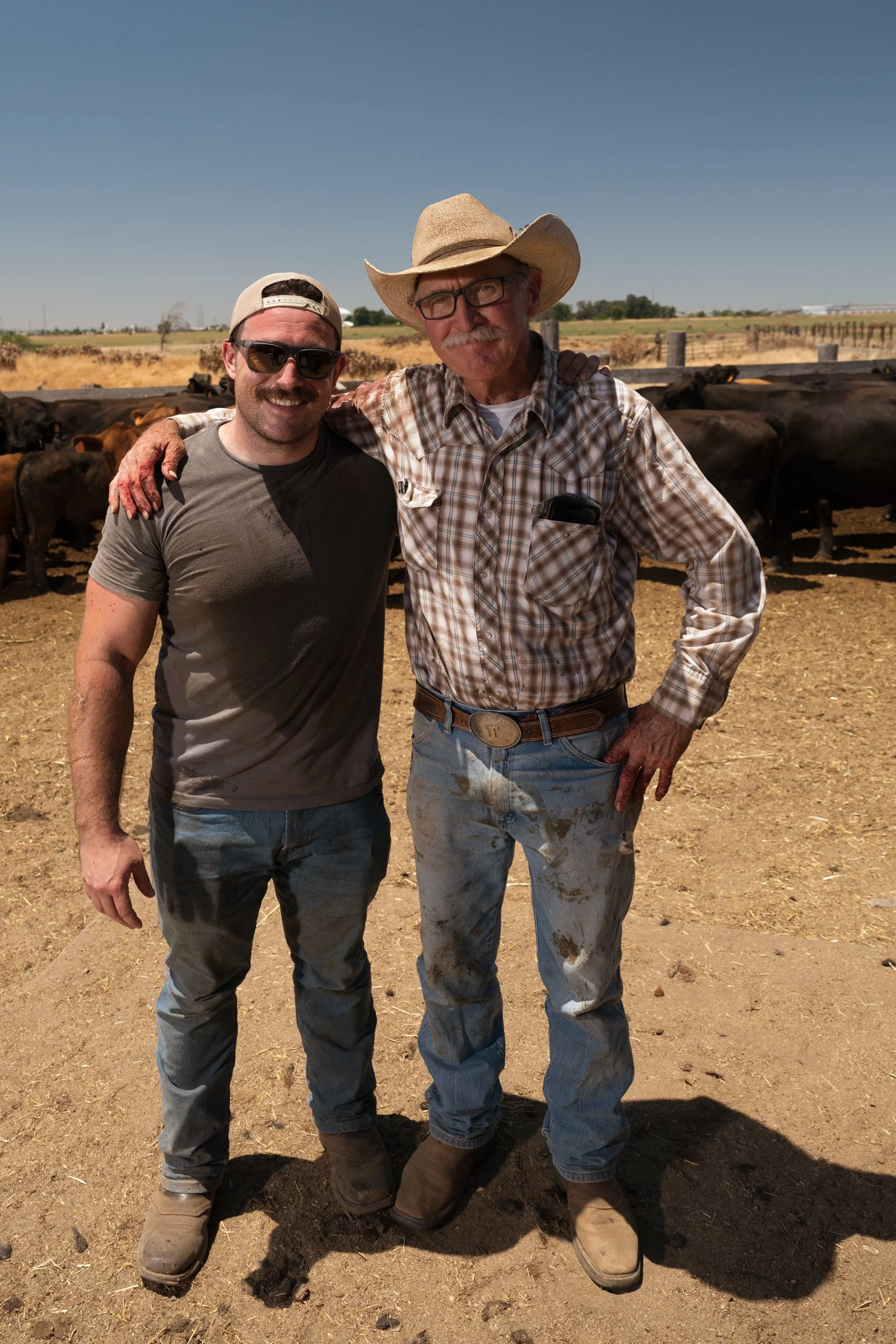 Tom Mayan and son Troy Mayan together after cattle roundup at Mahon Ranch Sacramento County California July 2025