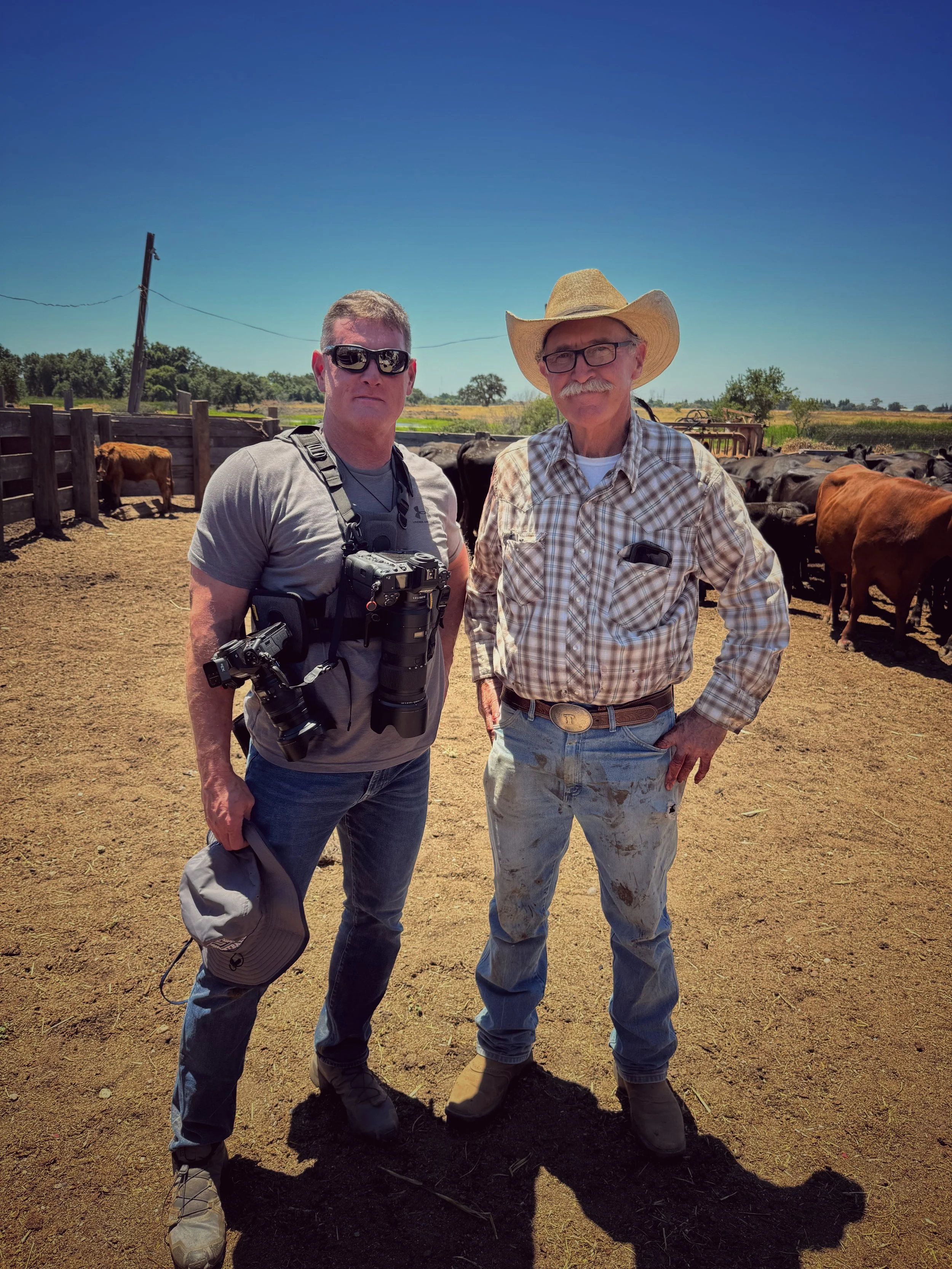 Photographer Tim Engle and rancher Tom Mayan together at Mahon Ranch cattle roundup Sacramento County California July 2025