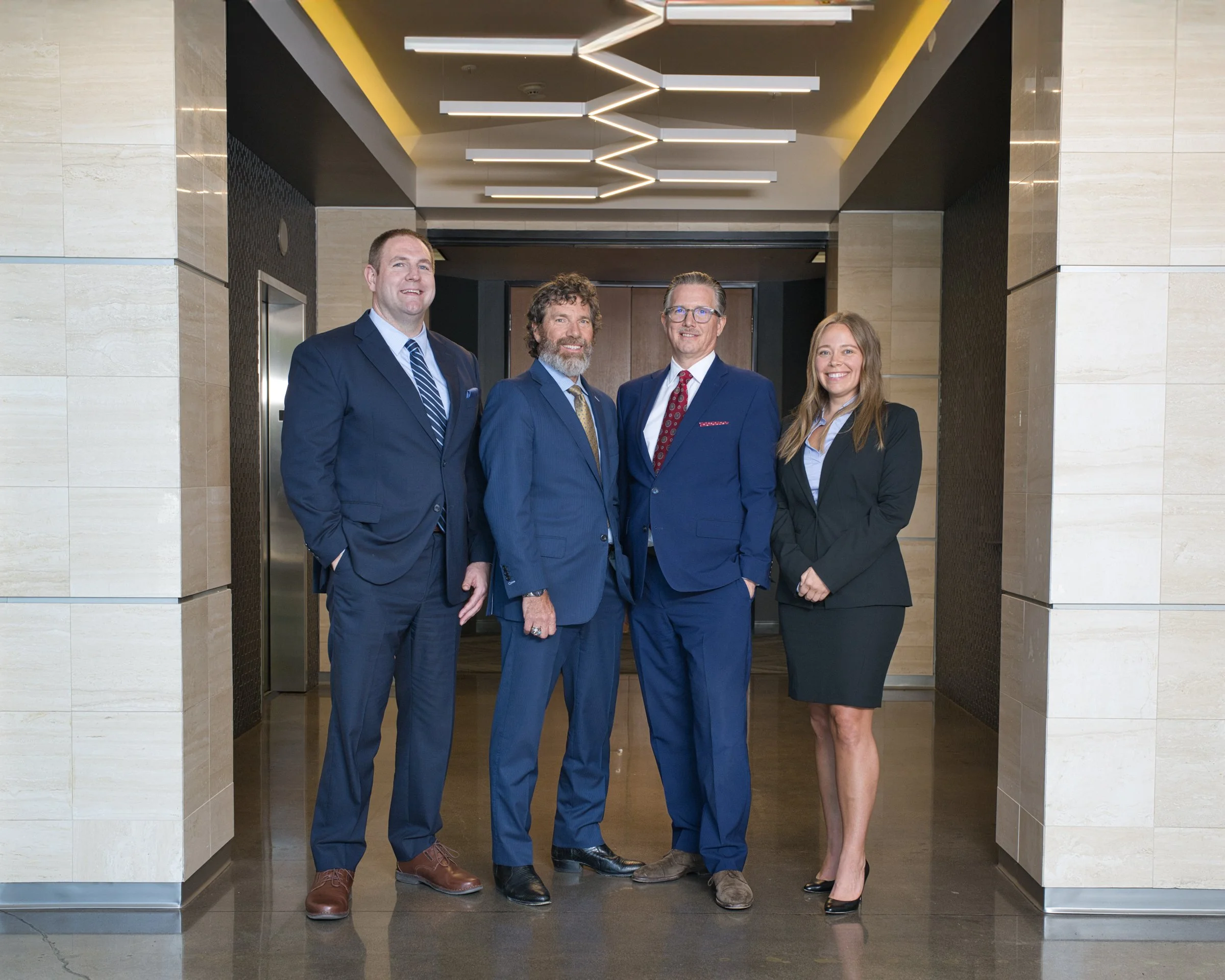Law firm corporate team headshots in suits and ties, on-location lobby portrait, Sacramento CA